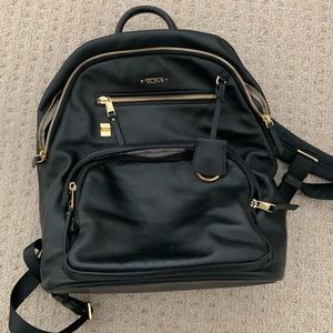 Basically new Tumi black leather Hilden backpack from the Voyageur collection.